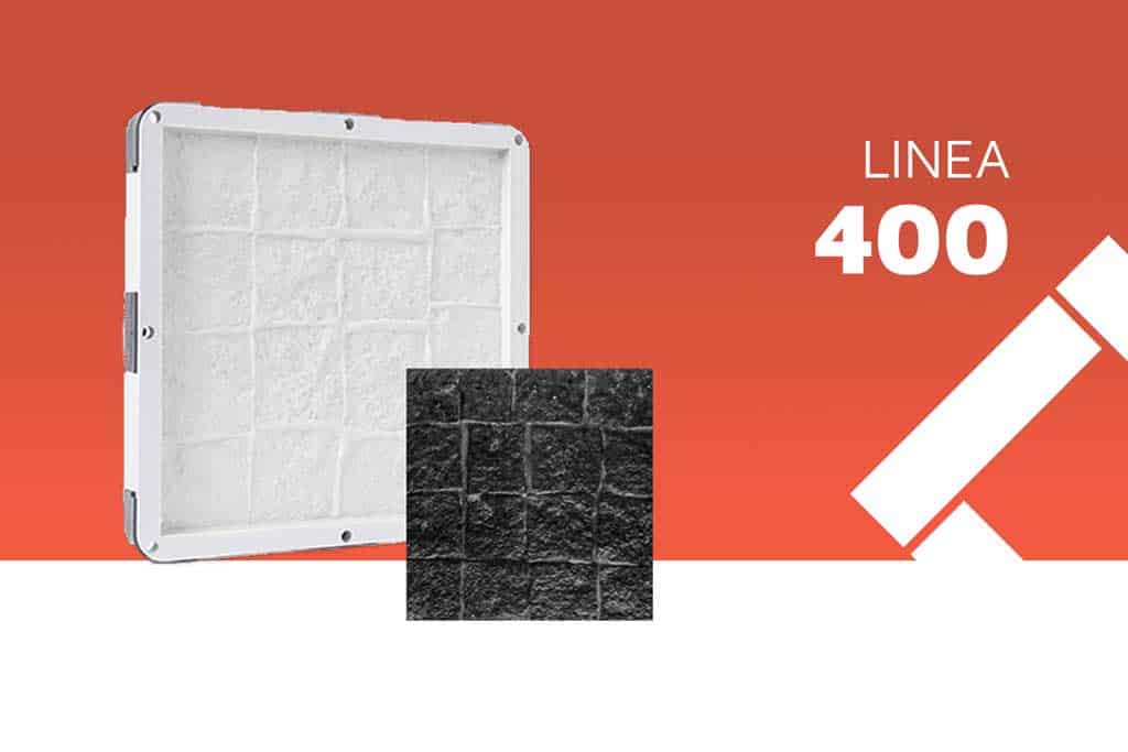 Molde de fabricación profesional para la Línea 400 junto a una placa terminada en color negro con textura de piedra rústica y diseño cuadriculado.